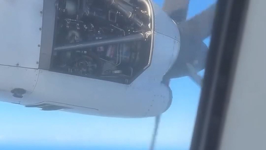 Terrifying moment passenger plane's engine breaks apart in mid-air
