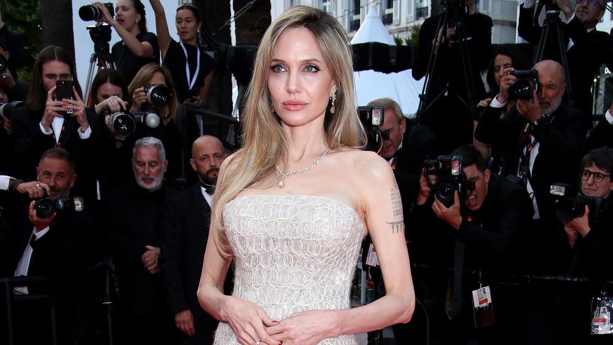 Angelina Jolie exudes glamour in an elegant cream gown as she joins Natalie Portman, Julia Garner and Emma Stone at the Eddington premiere during Cannes Film Festival