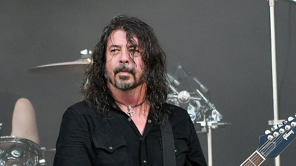 Foo Fighters FIRE band member in shock decision... 8 months after Dave Grohl's secret affair rocked the group