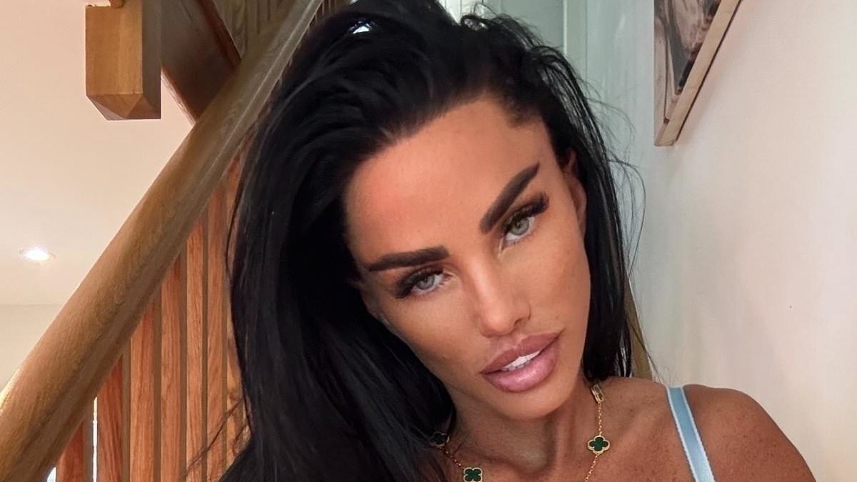 Katie Price slips into VERY racy lingerie as she poses with a plaster on her bottom after undergoing filler injections - amid concern for her shrinking appearance