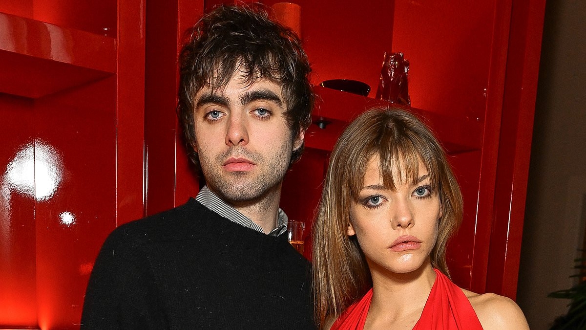 Lennon Gallagher's girlfriend Isobel Richmond wows in a plunging red dress as couple cosy up at The Standard