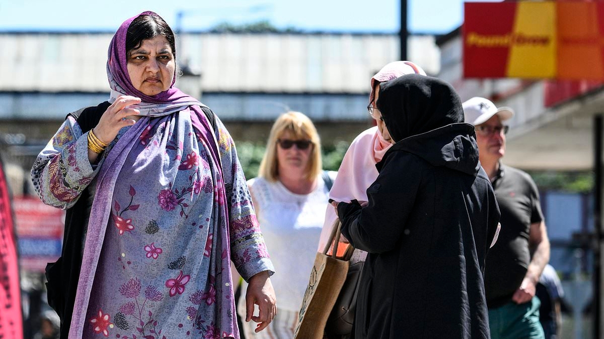 EXCLUSIVE We live in Britain's 'valley of strangers': Inside Muslim-majority northern town where locals say there is 'no point speaking English' and others say 'no one talks too each other'