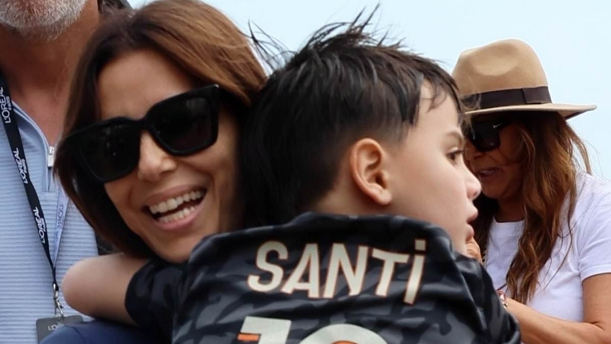 Beaming Eva Longoria is every inch of the doting mother as she carries son Santiago, 6, in her arms during the Cannes Film Festival