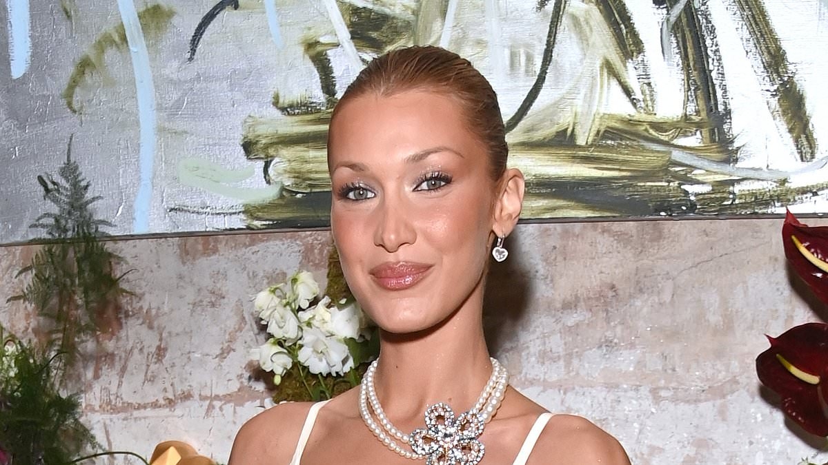 Bella Hadid makes two outfit changes for the launch party of her new fragrance Orebella as she swaps busty white gown for dazzling silver minidress