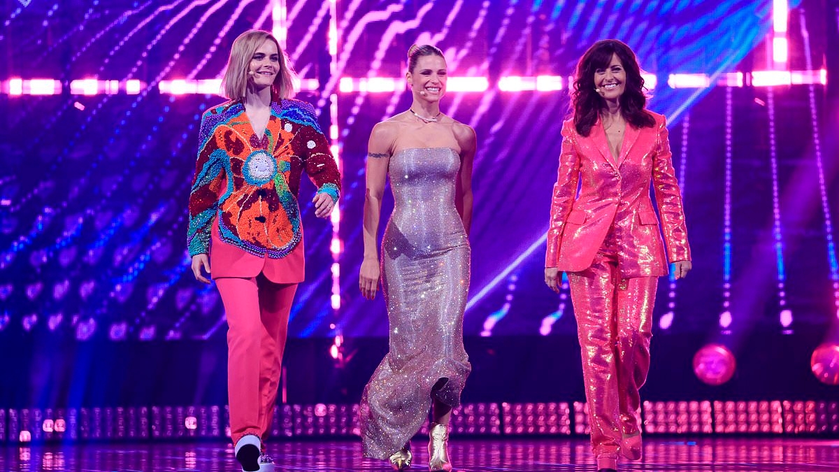 Michelle Hunziker looks incredible in a glitzy silver gown as she co-hosts 2025 Eurovision final alongside Sandra Studer and Hazel Brugger