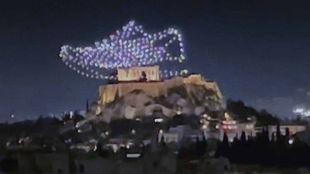 Outrage in Greece after 'Adidas advert' appears to show drone shoe 'booting' the Acropolis - as Greek government vows to take 'legal action'