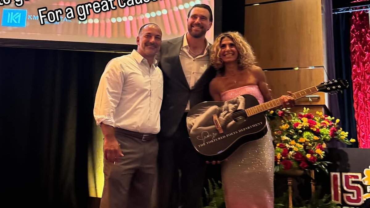 Travis Kelce poses with fans who bought stunning Taylor Swift merch at Patrick Mahomes' charity event