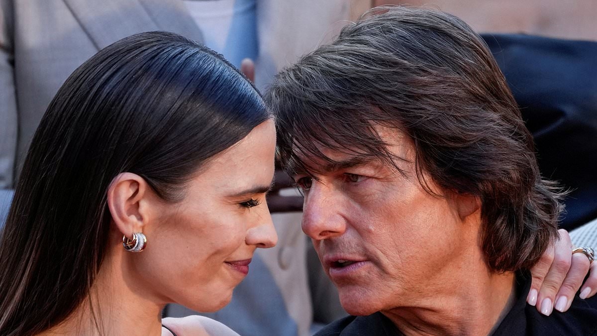 Hayley Atwell shares an affectionate moment with leading man Tom Cruise as they attend the New York premiere of Mission: Impossible 8 - amid his fresh romance with Ana de Armas