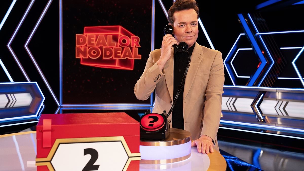 REVEALED: Deal Or No Deal's infamous banker FINALLY unmasked 20 years on from first ever episode - and he's a familiar TV face