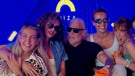At least one Lineker has got a smile on his face! As Gary gets BBC chop, brother Wayne parties with young girls in Ibiza