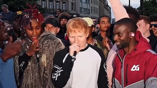 Ed Sheeran sends fans WILD with an impromptu performance on the streets of Sheffield