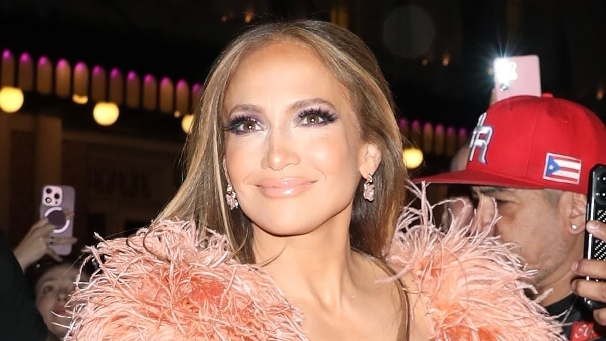 Braless Jennifer Lopez, 55, suffers a nip slip in a plunging peach dress before swiftly changing into a high neck white gown at benefit concert