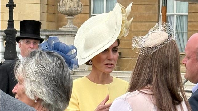 Kate welcomes grieving parents of teen photographer Liz Hatton who died of cancer aged 17 at Buckingham Palace Garden Party