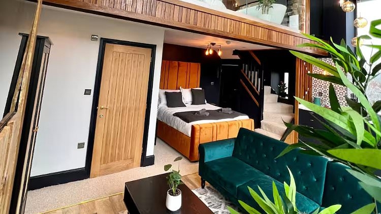 Holiday home owner complains neighbours are shunning him after turning barn into £500-a-night chalet and letting it out to 'naked and rowdy guests'
