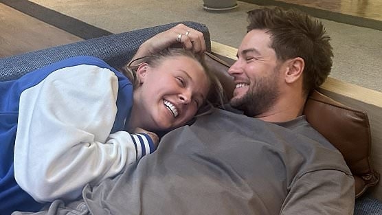 JoJo Siwa and Chris Hughes' fans are convinced they have confirmed relationship with very cosy snaps from her 22nd birthday as she says her 'heart is overflowing'