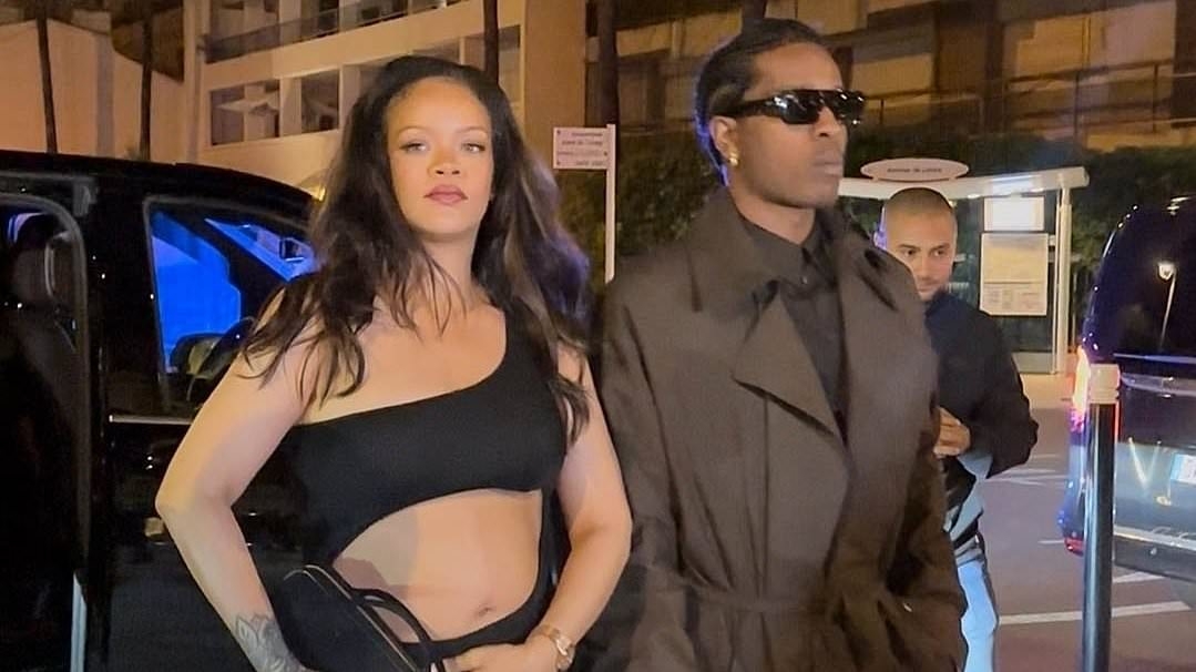Rihanna shows off her baby bump in a cut-out dress as she steps out with partner A$AP Rocky in Cannes