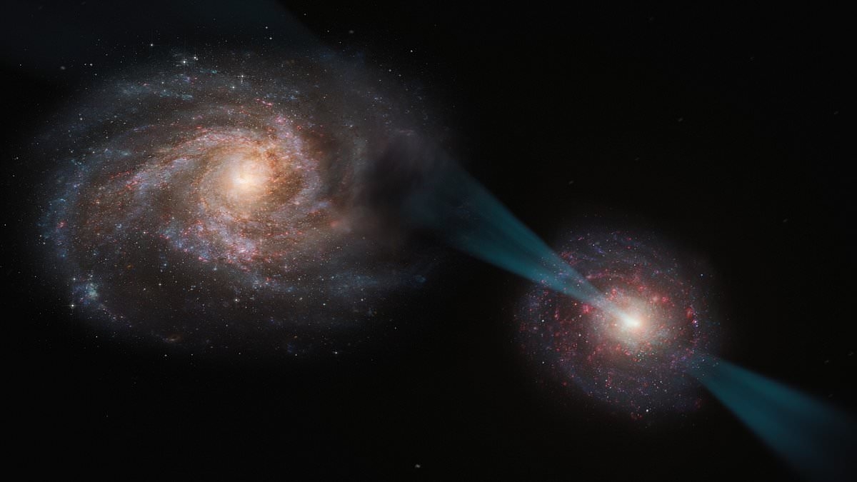 Scientists are baffled after spotting two galaxies entangled in a 'cosmic joust'