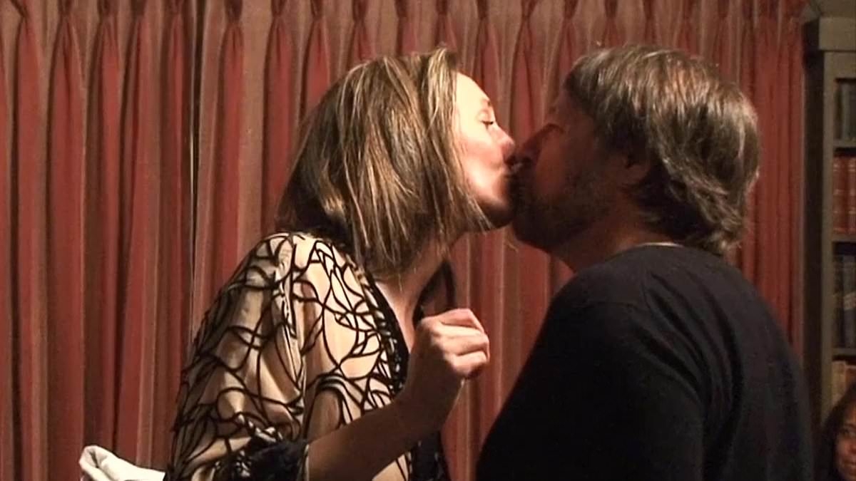 Woman's extraordinarily intimate on-stage act with two men revealed after she bizarre 'orgasm cult'