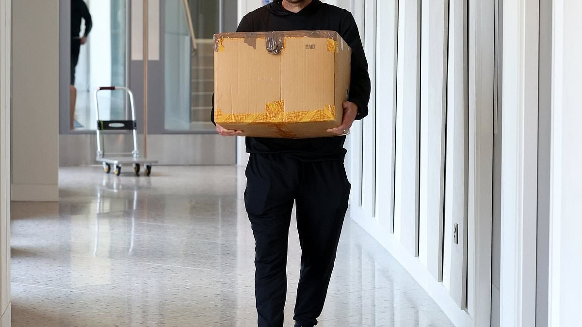 Glum Jamie Vardy carries his things in cardboard box as he leaves Leicester base ahead of new life with wife Rebekah after playing his final game for the club