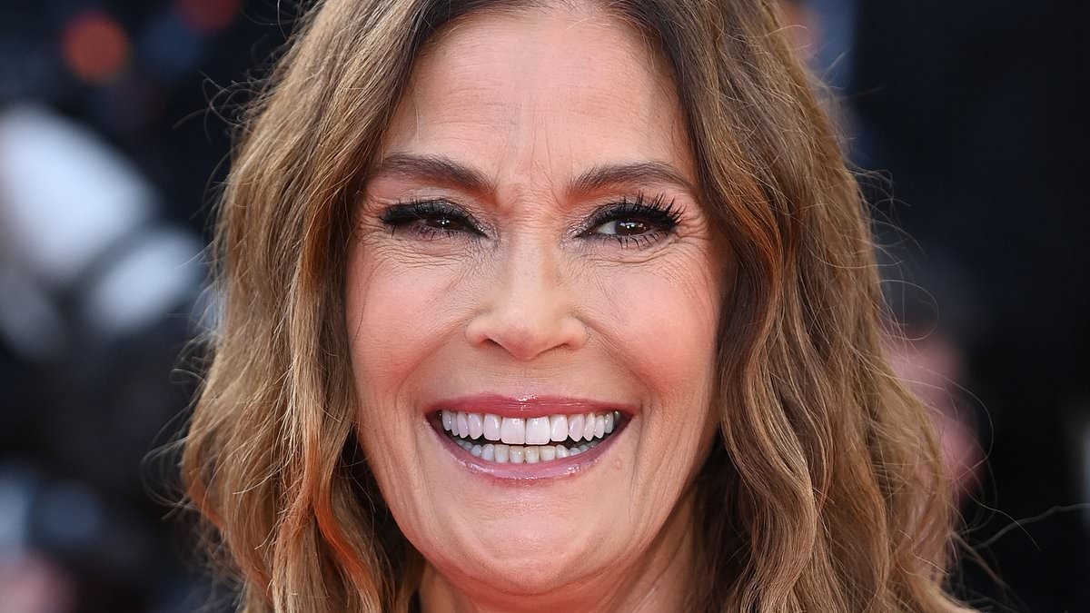 Teri Hatcher, 60, puts on a busty display in a plunging glitzy green gown as she attends The History of Sound premiere during Cannes Film Festival