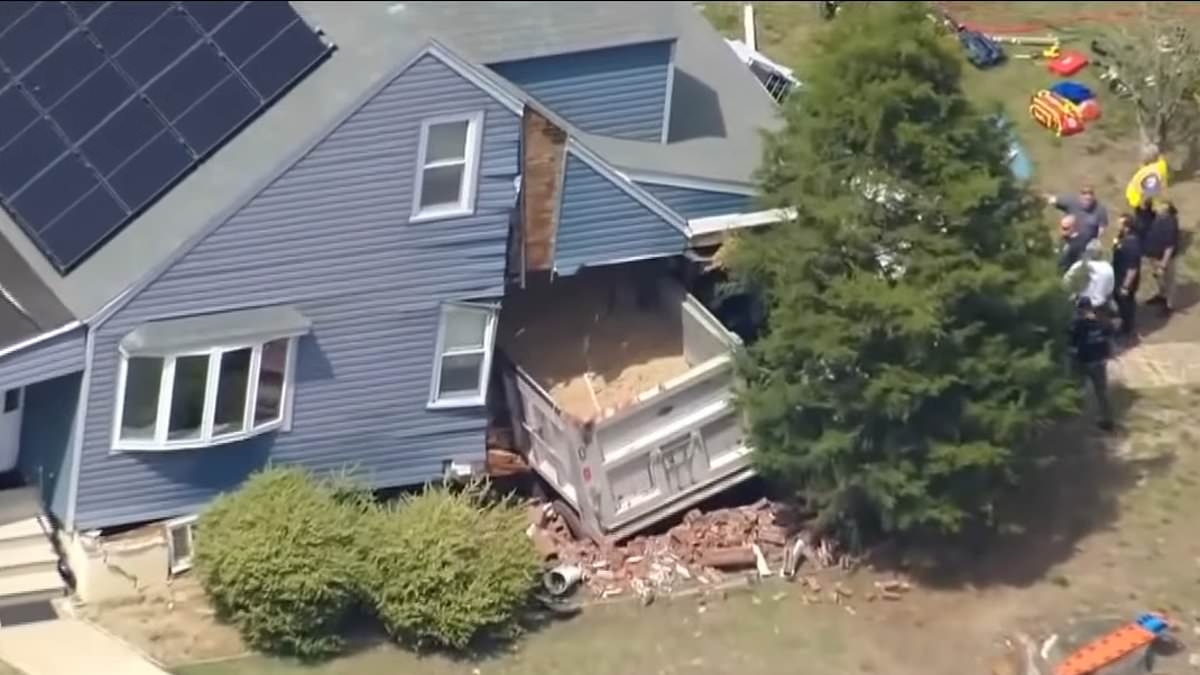 Dashcam footage captures moment dump truck smashes into home after driver suffers 'medical emergency'