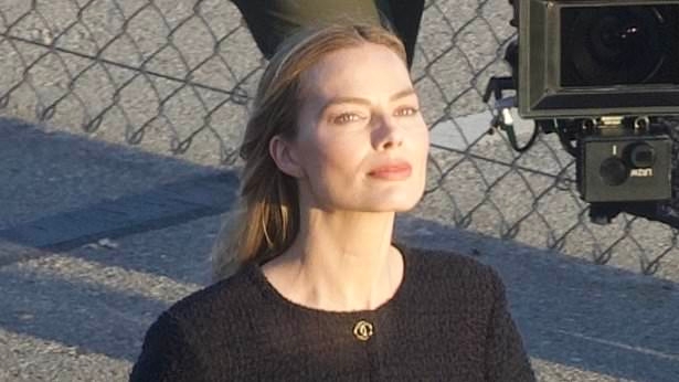 Margot Robbie shows off her toned postpartum figure during Malibu shoot before slipping into a swimsuit