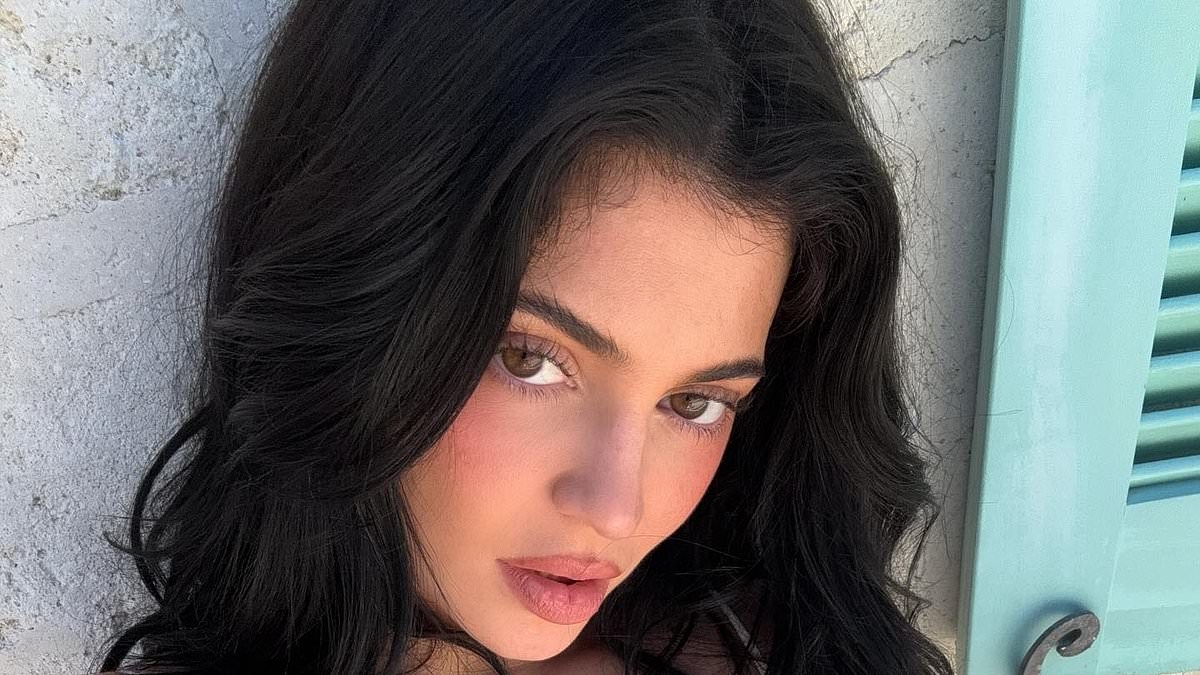 Busty Kylie Jenner almost spills out of VERY revealing monokini as she gets 'ready for summer'