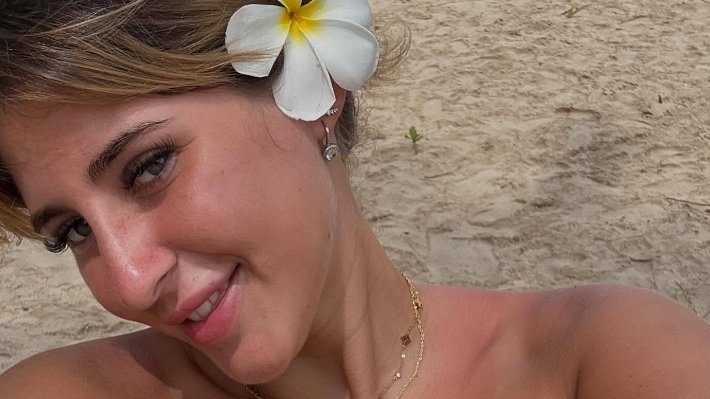 British teen 'drug mule' locked up in a horror Georgia jail 'is finally reunited with her father' after he jetted to the ex-Soviet state to be by her side