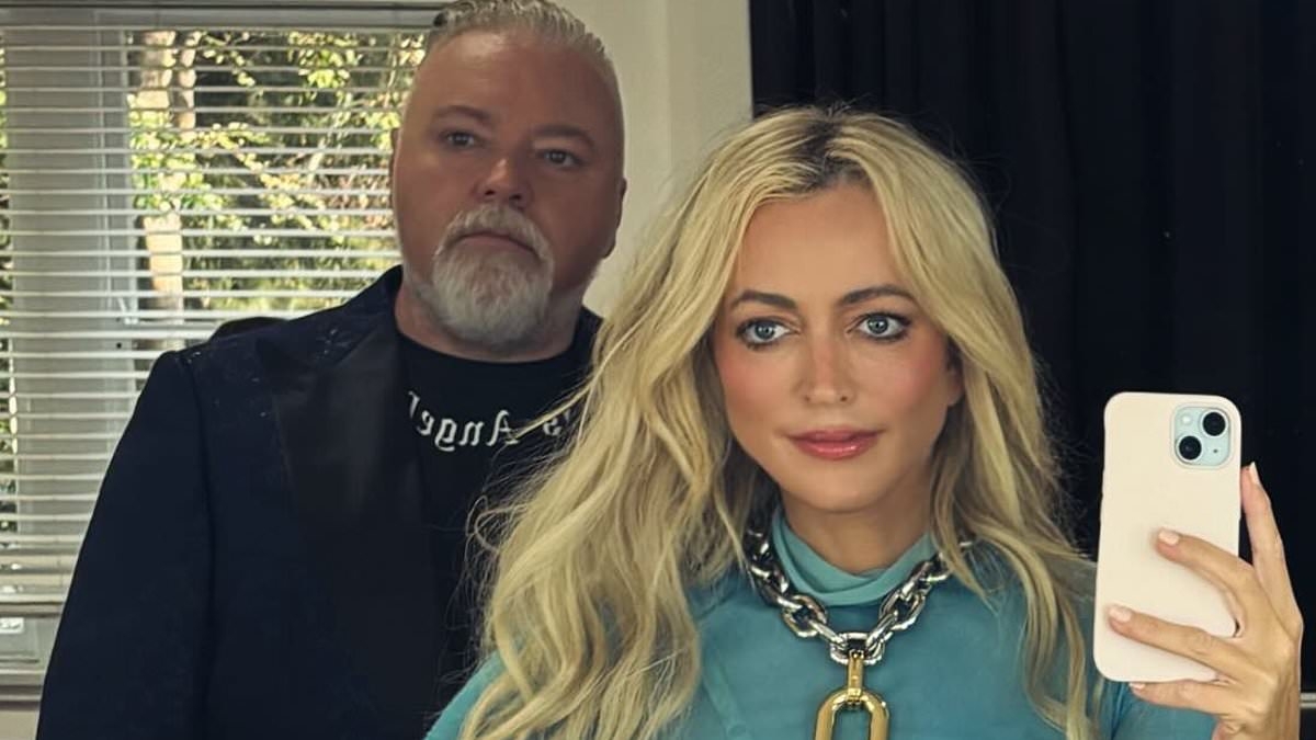 Kyle & Jackie O star attacked with a hose in heated exchange after confronting the show's 'biggest hater': 'She's threatening me!'