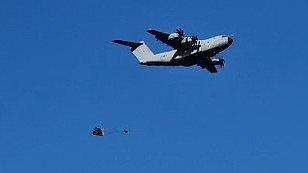 British paratroopers parachute onto Swedish island as part of NATO exercise preparing to defend Europe from Russia... and are asked to show their PASSPORTS