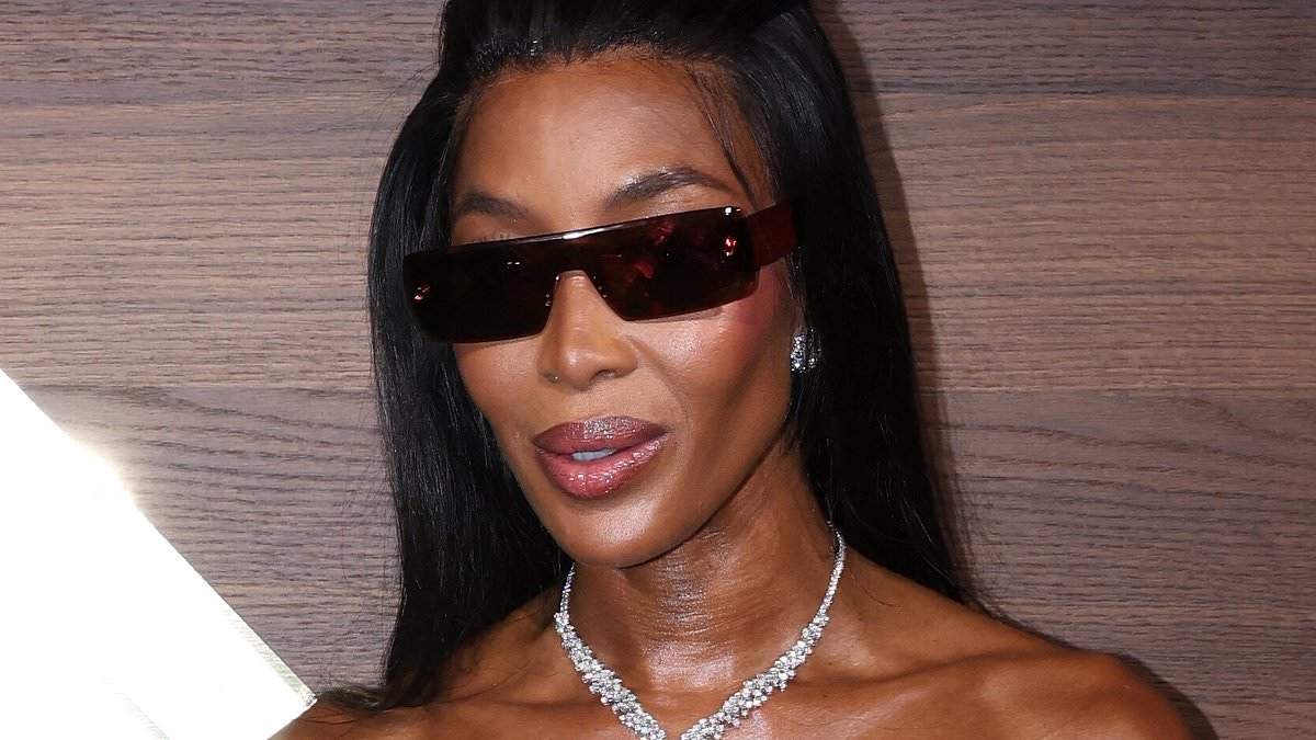 Naomi Campbell turns heads in a strapless black dress as she joins glamorous Coco Rocha and Ciara at the Killian Paris party in Cannes