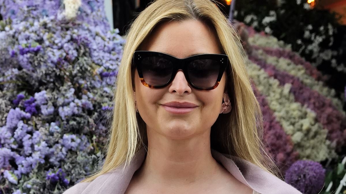 Holly Valance looks stunning in a floral purple dress as she joins pal Lizzie Cundy for a swanky lunch in Chelsea