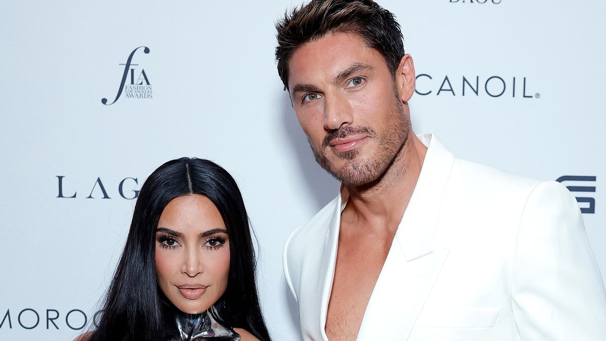 Kim Kardashian's hairstylist Chris Appleton leaves little to the imagination in TINY speedo