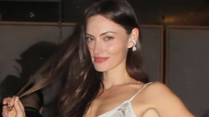 Phoebe Tonkin's WILD wedding cake raises eyebrows as the Aussie star shares behind-the-scenes snaps from her nuptials to Bernard Lagrange
