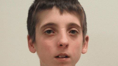 Frantic search is launched for young boy last seen leaving home with a black duffle bag TWO WEEKS ago