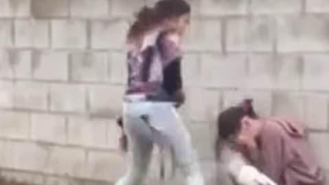 'Evil' teen bullies get taste of vigilante 'justice' after they were filmed beating disabled woman