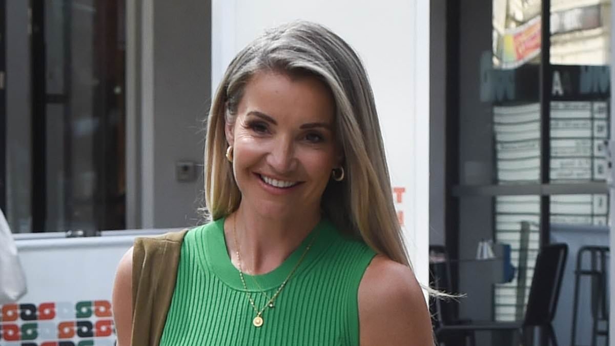 Helen Skelton can't keep the smile off her face as she leaves Morning Live moments before 'love interest' Gethin Jones after 'growing close off-camera'
