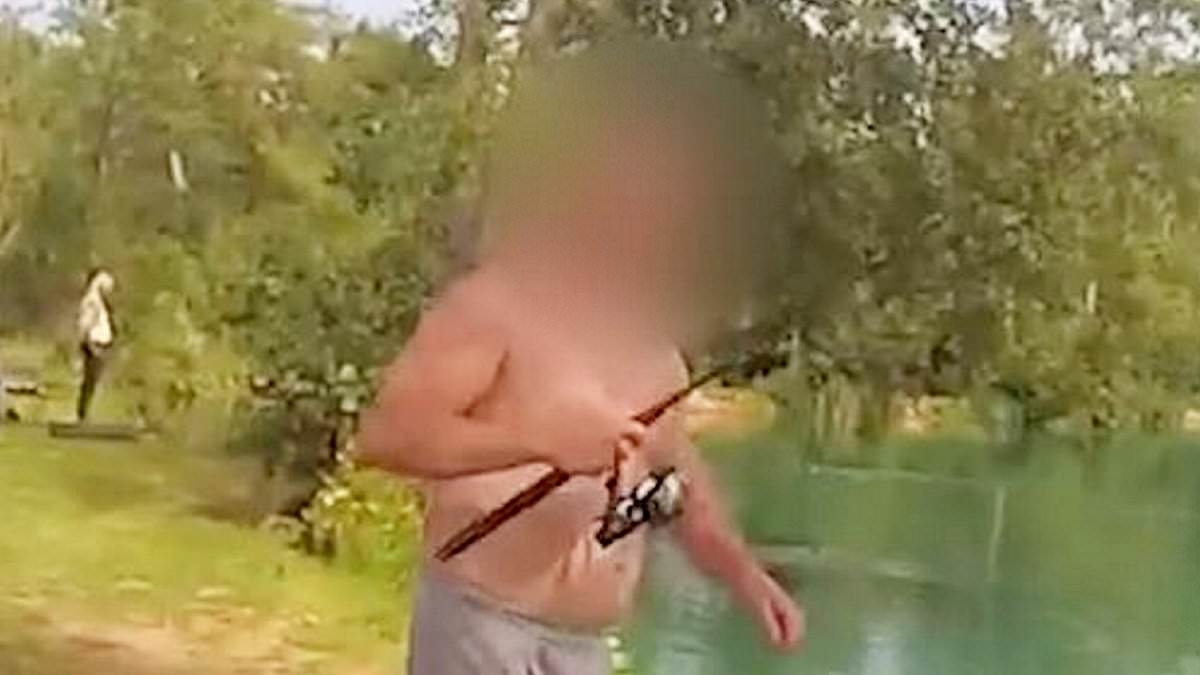 Shocking moment father and son fishermen attack water bailiffs when they are caught angling without a licence