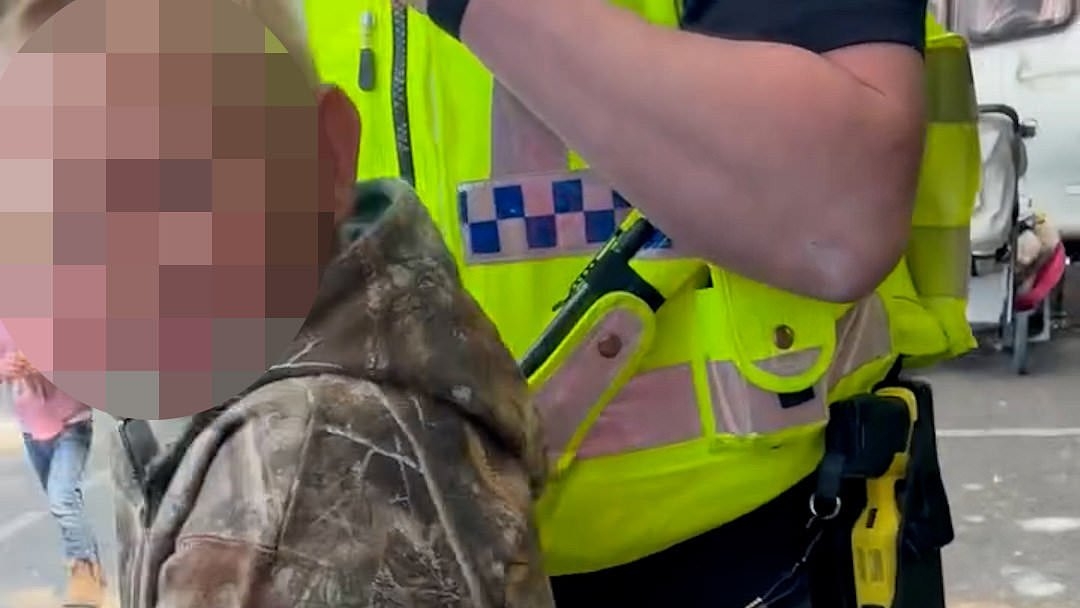 EXCLUSIVE Moment police arrest and handcuff two '10-year-old boys' as furious mother accuses force of 'pure abuse of power' in lead-up to Appleby Horse Fair