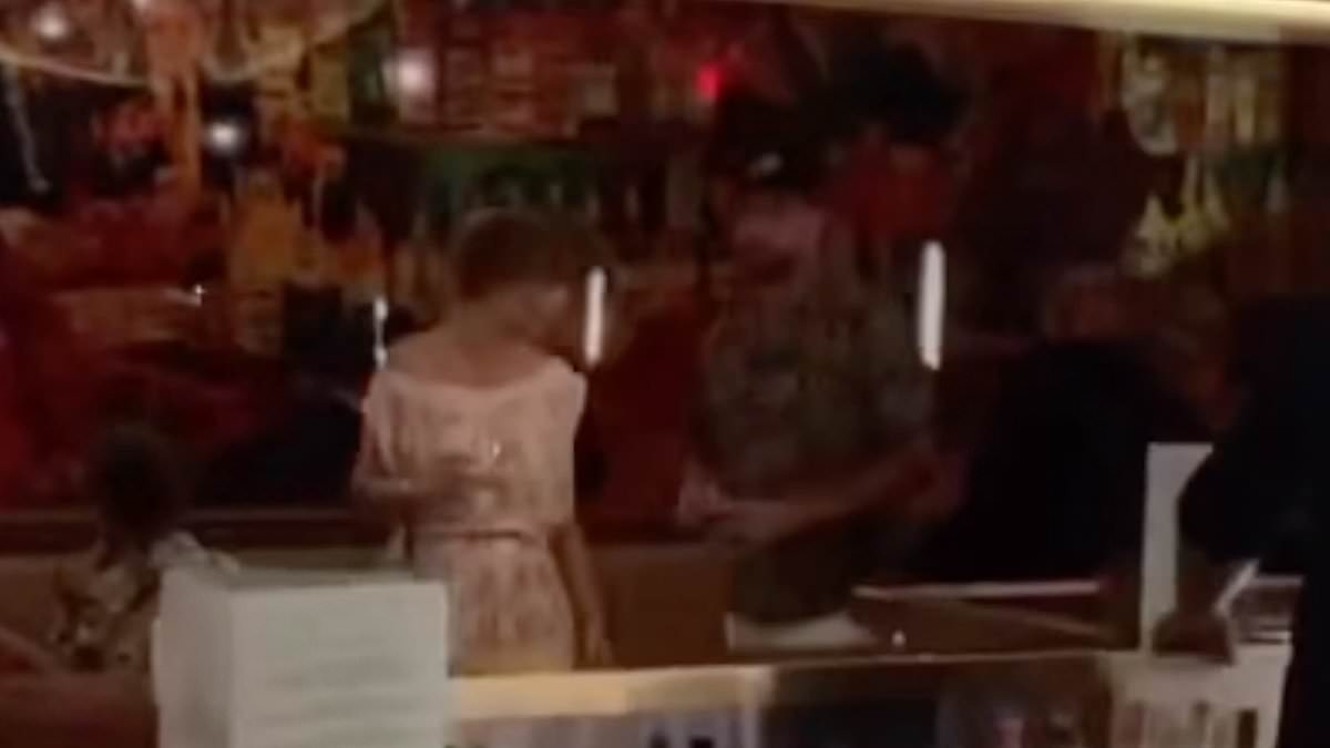 Watch Taylor Swift FINALLY break cover on date night with Travis Kelce... and he looks transformed