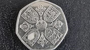 Rare 50p coin of King Charles is selling for more than £75,000 on eBay as collectors scramble to win auction