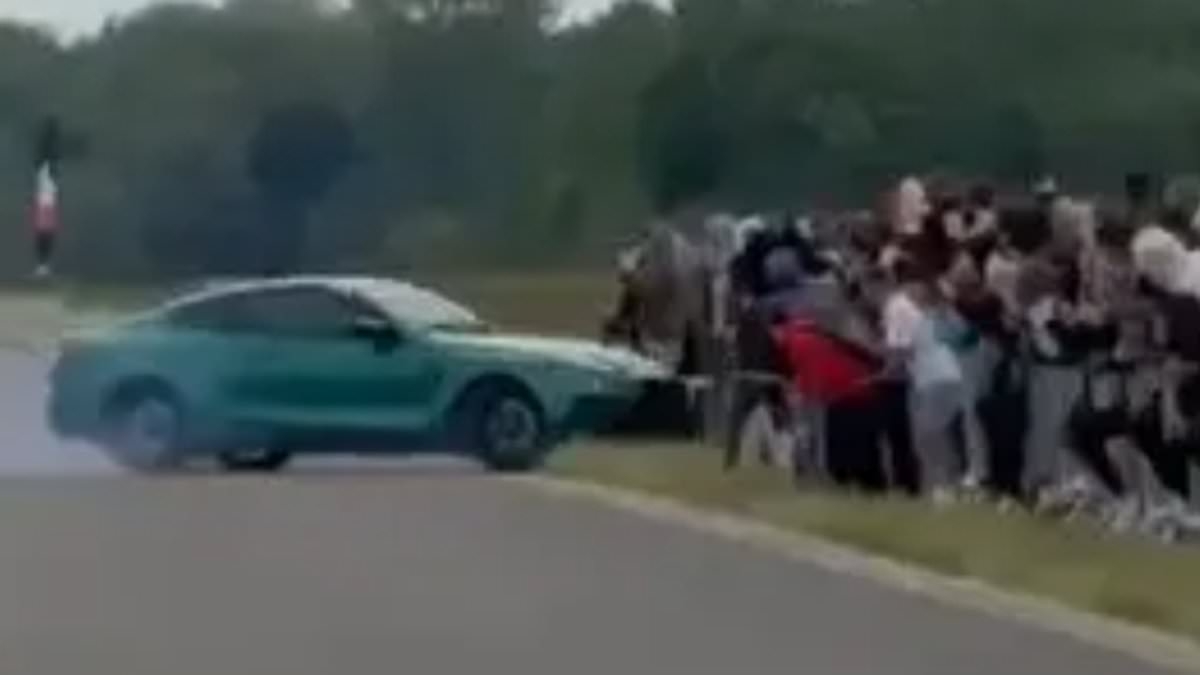 Horrifying moment car crashes into crowd of spectators at Polish drag racing event - leaving at least 17 injured