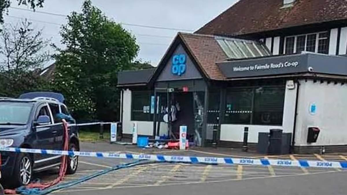 Moment masked gang drive their Volkswagen into a Co-op - before driving off with the cash machine