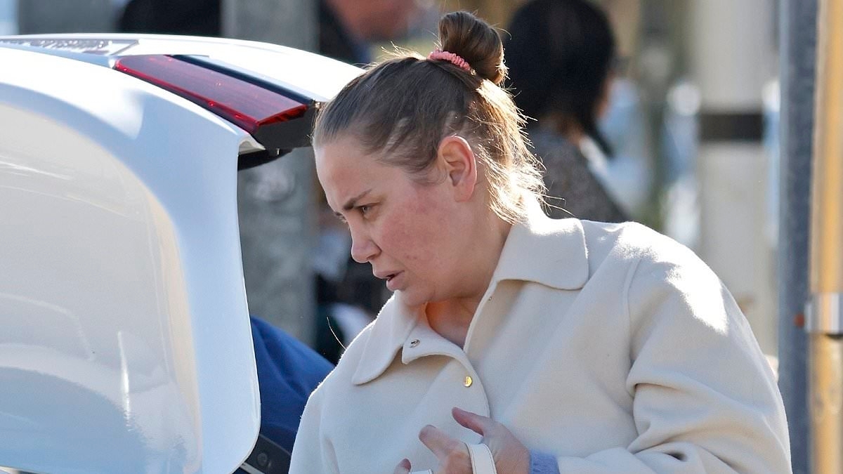 Jelena Dokic is seen for the first time since announcing the death of her abusive father as she jets into Brisbane