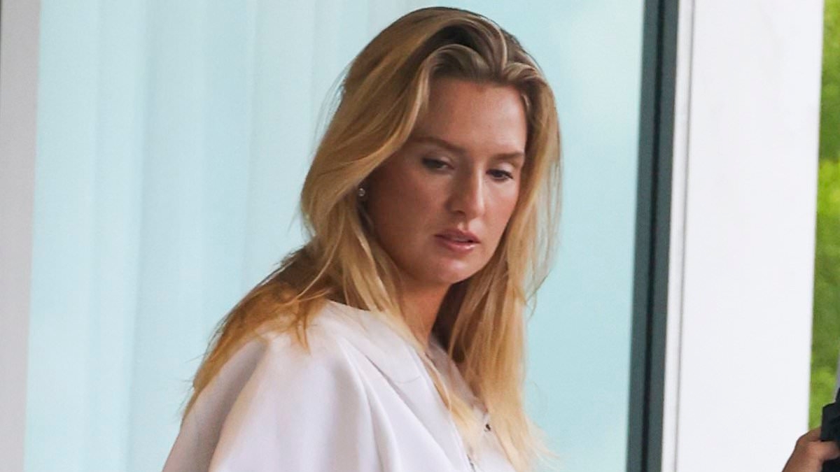 It's not all glitz and glam! Eastern Suburbs socialite Bernadette Fahey cleans up outside her hot-spot Bondi Pilates studios as she is ribbed for her 'hocus pocus' sound healing sessions