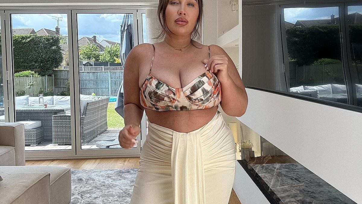 Lauren Goodger puts on a busty display as she poses for selfies in a floral bra top after vowing to get her 'bikini body' back