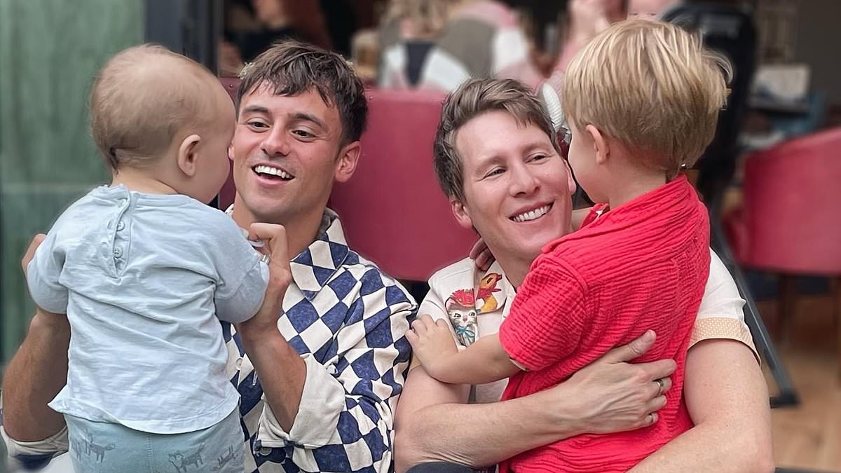 Tom Daley reveals a stranger once asked if he needed help changing his son's nappy as he opens up about the assumed incompetence male same-sex parents face