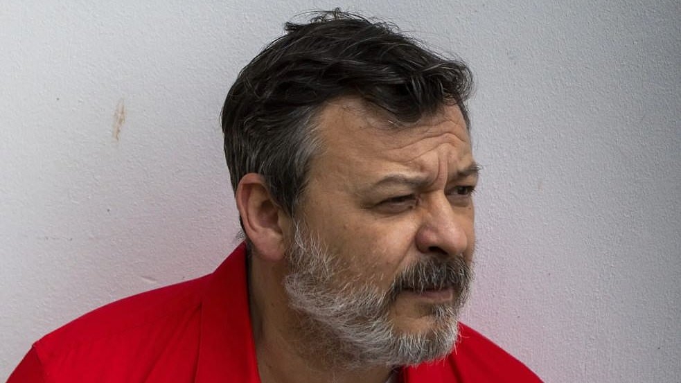 Legendary Welsh rocker looks unrecognisable with a greying beard more than three decades after his iconic band's chart-topping heyday - but do YOU know who he is?