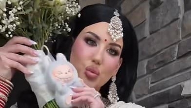 Now even WEDDINGS are gripped by Labubu fever! Brides are throwing £50 toys instead of bouquets amid shopper brawls over the popular items