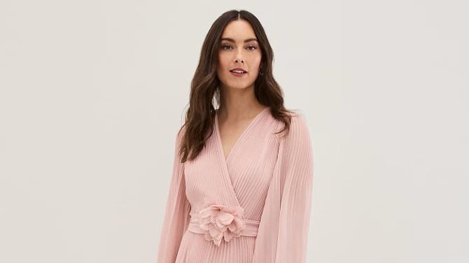 Queen Camilla just embraced this season's must-have hue in understated powder pink outfit - and it's perfect for summer weddings